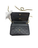 Sac à bandoulière Wallet On Chain en cuir caviar noir - Chanel
