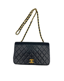 Sac à bandoulière Mademoiselle Médium en cuir lisse noir et doré - Chanel