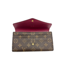 Portefeuille Sarah en toile monogram et cuir - Louis Vuitton