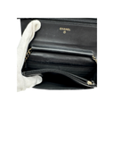 Sac à bandoulière Wallet On Chain Boy en cuir caviar noir - Chanel