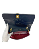 Sac à bandoulière Mademoiselle Médium en cuir lisse noir et doré - Chanel
