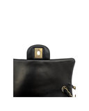 Sac à bandoulière Mini Timeless en cuir chevron noir - Chanel