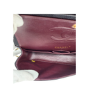 Sac à bandoulière Timeless 11.12 en cuir caviar noir - Chanel