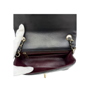 Sac à bandoulière Mini Timeless en cuir chevron noir - Chanel