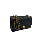 Sac à bandoulière Timeless 11.12 en cuir caviar noir - Chanel