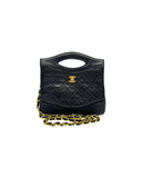 Sac à bandoulière 31 vintage en cuir lisse noir et doré - Chanel