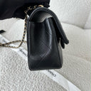 Sac à bandoulière Top Handle en cuir lisse noir - Chanel
