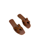 Sandales Oran en cuir gold - Hermès