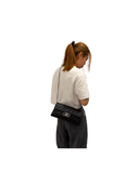 Sac à bandoulière East West Timeless en cuir lisse noir - Chanel