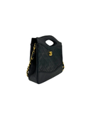 Sac à bandoulière 31 vintage en cuir lisse noir et doré - Chanel
