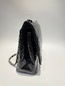 Sac à bandoulière Maxi Jumbo en cuir verni noir - Chanel