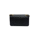 Sac à bandoulière Timeless 11.12 en cuir caviar noir - Chanel