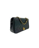Sac à bandoulière Mademoiselle Médium en cuir lisse noir et doré - Chanel