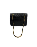 Sac à épaule matelassé vintage en cuir lisse d'agneau noir - Chanel