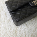 Sac à bandoulière Timeless 25CM en cuir lisse noir - Chanel