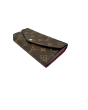 Portefeuille Sarah en toile monogram et cuir - Louis Vuitton