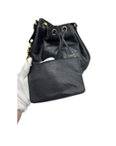 Sac seau Coco Mark à bandoulière en cuir caviar noir - Chanel