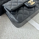 Sac à bandoulière Top Handle en cuir lisse noir - Chanel