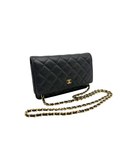 Sac à bandoulière Wallet-On-Chain en cuir caviar noir et doré - Chanel