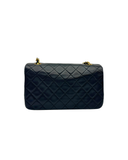 Sac à bandoulière Mademoiselle Médium en cuir lisse noir et doré - Chanel