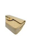Sac à bandoulière Timeless Vintage en cuir lisse beige - Chanel