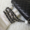 Sac à bandoulière Timeless 25CM en cuir lisse noir - Chanel