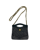 Sac à bandoulière 31 vintage en cuir lisse noir et doré - Chanel