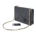 Sac à bandoulière Coco mark matelassé en cuir lisse noir - Chanel