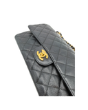 Sac à bandoulière Timeless 11.12 en cuir caviar noir - Chanel