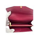 Portefeuille Sarah en toile monogram et cuir - Louis Vuitton