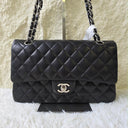 Sac à bandoulière Timeless 25CM en cuir lisse noir - Chanel