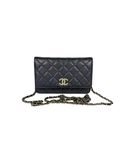 Sac à bandoulière Wallet On Chain en cuir lisse noir - Chanel