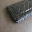 Sac à bandoulière Wallet On Chain en cuir lisse noir - Chanel