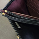 Sac à bandoulière Wallet On Chain en cuir lisse noir - Chanel
