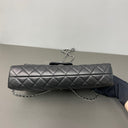 Sac à bandoulière East West Timeless en cuir lisse noir - Chanel