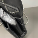 Sac à bandoulière East West Timeless en cuir lisse noir - Chanel