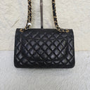 Sac à bandoulière Jumbo en cuir lisse noir - Chanel