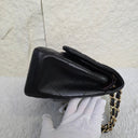 Sac à bandoulière Jumbo en cuir lisse noir - Chanel