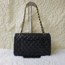 Sac à bandoulière Timeless 25CM en cuir lisse noir - Chanel