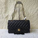 Sac à bandoulière Timeless 25CM en cuir lisse noir - Chanel