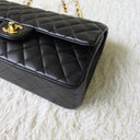 Sac à bandoulière Timeless 25CM en cuir lisse noir - Chanel