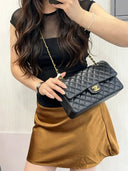 Sac à bandoulière Timeless 25CM en cuir lisse noir - Chanel