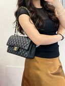 Sac à bandoulière Timeless 25CM en cuir lisse noir - Chanel