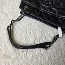 Sac à bandoulière Cabas Shopping Tote en cuir caviar noir - Chanel