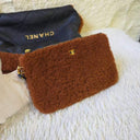 Sac à bandoulière Chanel 22 en cuir d'agneau retourné marron - Chanel