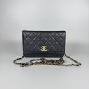 Sac à bandoulière Wallet On Chain en cuir lisse noir - Chanel