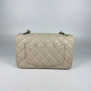 Sac à bandoulière Mini Timeless en cuir caviar beige - Chanel
