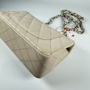 Sac à bandoulière Mini Timeless en cuir caviar beige - Chanel