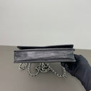 Sac à bandoulière Wallet-On-Chain en cuir noir - Chanel