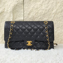 Sac à bandoulière Timeless 11.12 en cuir caviar noir - Chanel